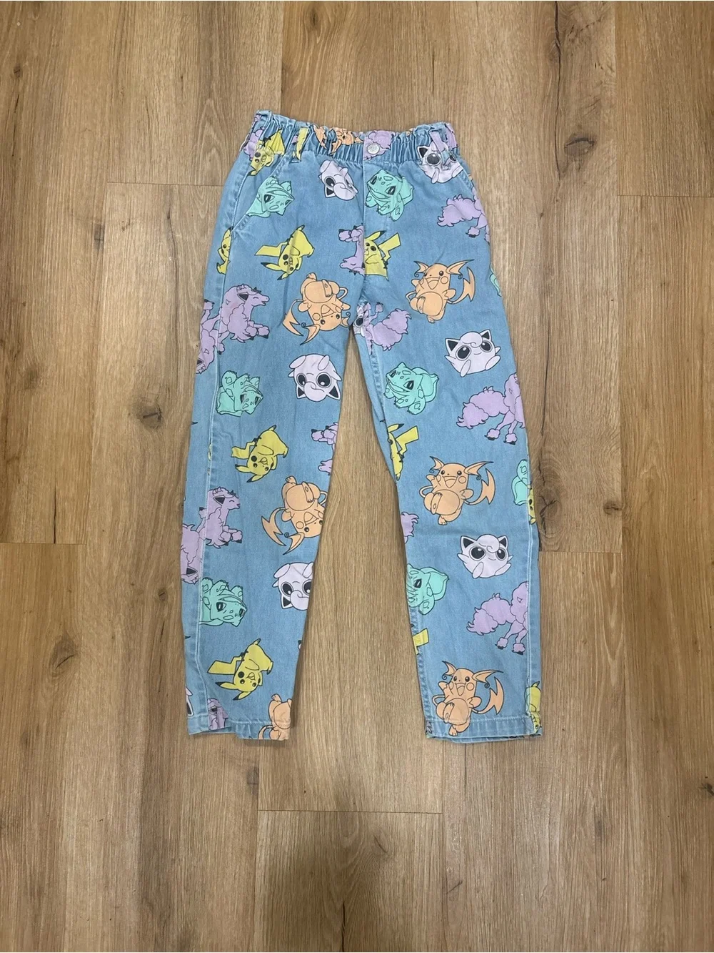 H&M Pokémon Print light denim relaxed fit paper bag Jean. Size 10